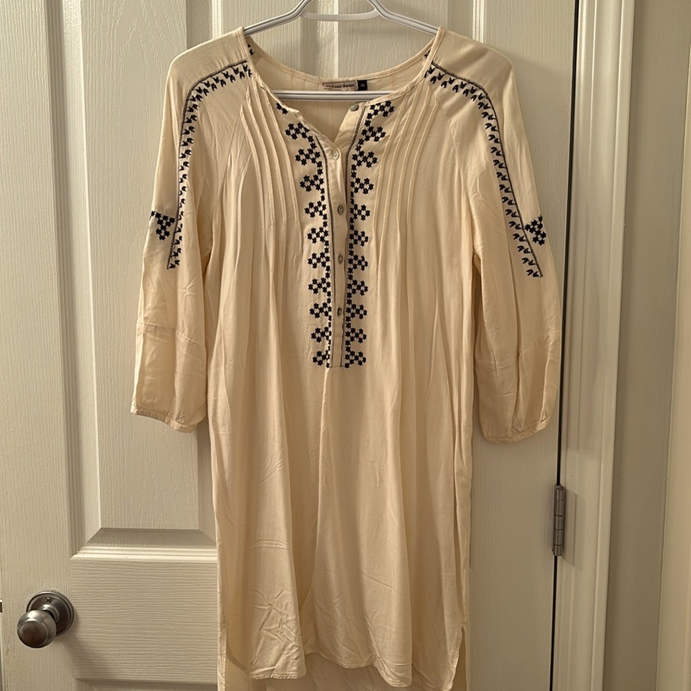Worn a few times so tags have been removed